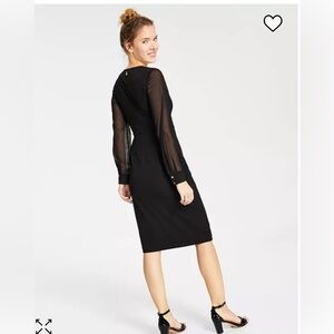 Tommy Hilfiger sheer sleeve asymmetrical black dress.